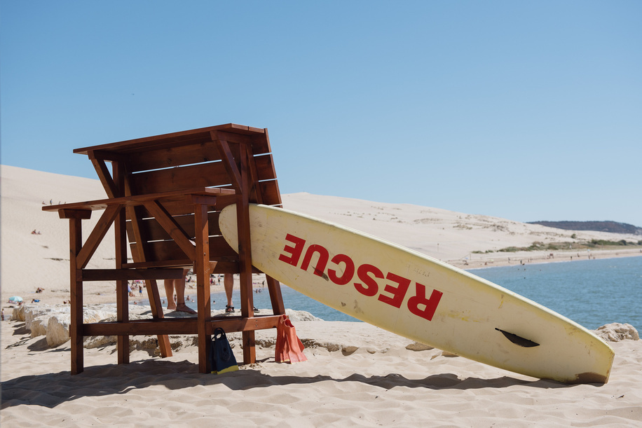 A lifeguard's rescue surfboard is pictured near a first aid post on the Pilat beach below the Dune du Pilat, Europe's largest sand dune, near La Taste-de-Buch in the Gironde department of France, during a hot summers day on July 30, 2022. The area had recently seen a dire heatwave, which coincided with terrible wildfires.