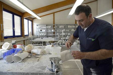 The prosthetic technician during the process of lower limb prosthesis fabrication at "Interorto German Prosthesis Center" LLC in Armenia