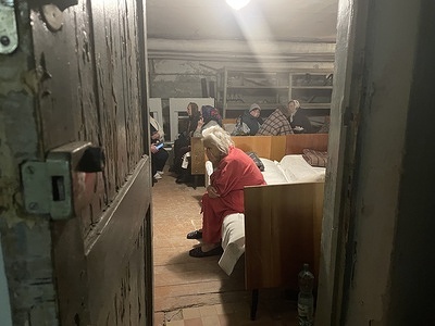 Elderly patients shelter in the basement of Novovolynsk Hospital, western Ukraine. For patients at Novovolynsk Hospital in western Ukraine, the sound of air raid sirens has suddenly become a common reality amid the military offensive in the country. Patients must move from a modern facility above ground to a 1950s-era underground bomb shelter with a rudimentary set-up that can fit up to 300 people. Read the story https://www.euro.who.int/en/countries/ukraine/news/news/2022/3/running-a-hospital-while-your-country-is-under-attack-a-story-from-western-ukraine .