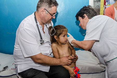 Young girl being examined by health professionals at a measles vaccination clinic.

In 2016, the Ministry of Health, together with WHO, the National Institute of Public Health, the National Society of Family Medicine, and the United Nations Children’s Fund (UNICEF), launched an action plan to limit the measles outbreak. The plan includes supplemental immunization activities and introduction of a “dose zero” of measles, mumps and rubella vaccine, to be given to children between the ages of 9 and 11 months