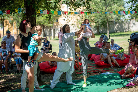New mothers and pregnant women learning exercises during an event for World Breastfeeding Week, 1–7 August 2019. A team of breastfeeding experts visited 11 communities across the Republic of Moldova, covering the north, south and the left bank of the Dniester River, with a mandate to “support parents and encourage breastfeeding”.

Women attain numerous benefits from physical activity during and after pregnancy. Local sport instructors demonstrated a set of exercises for pregnant women and new mothers, which were in turn practiced by the participants.