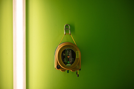 Emergency Defibrillator mounted inside an apartment complex in Copenhagen.