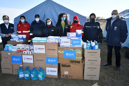 WHO Moldova has delivered today first batch of much-needed support on urgent health issues to the refugees coming from Ukraine in a camp situated near by Palanca border crossing point between the Republic of Moldova and Ukraine. In the context on both COVID-19 pandemic and humanitarian crisis, the WHO was engaged with partners to carry on hand disinfectants, face masks and respirators, gloves, non-contact thermometers, electronic tonometers, and pulse oximeters. All supplies were donated to the General Inspectorate for Emergency Situations of the Ministry of Interior Affairs. The quantities are sufficient to cover also for the needs for the second refugees camp located in northern part of country, in Ocnița district. This is a second day of WHO mission on the ground, after rapid assessment of urgent needs at points of entry conducted a day before. The WHO will continue to support the Ministry of Health and authorities in managing the COVID-19 pandemic and humanitarian crisis, providing technical support and supplies, together with UN partners and donors. In last 24 hours more than 16.000 citizens of Ukraine entered the Republic of Moldova.