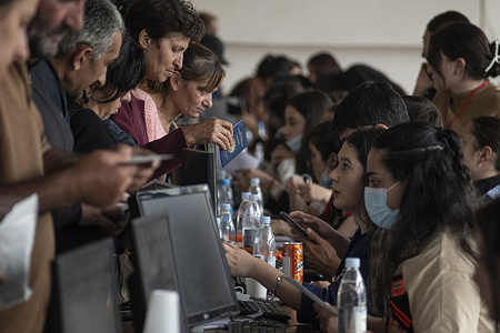 29, September 2023 - In less than a week, well over 100,000 refugees enter Armenia.  At the registration desk in Goris refugee center: Refugees need to be registered for transport and housing.