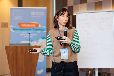 Kimberly Rambaud, a member of WHO/Europe's Risk Communication, Community Engagement and Infodemic management team, conducts a training session. 